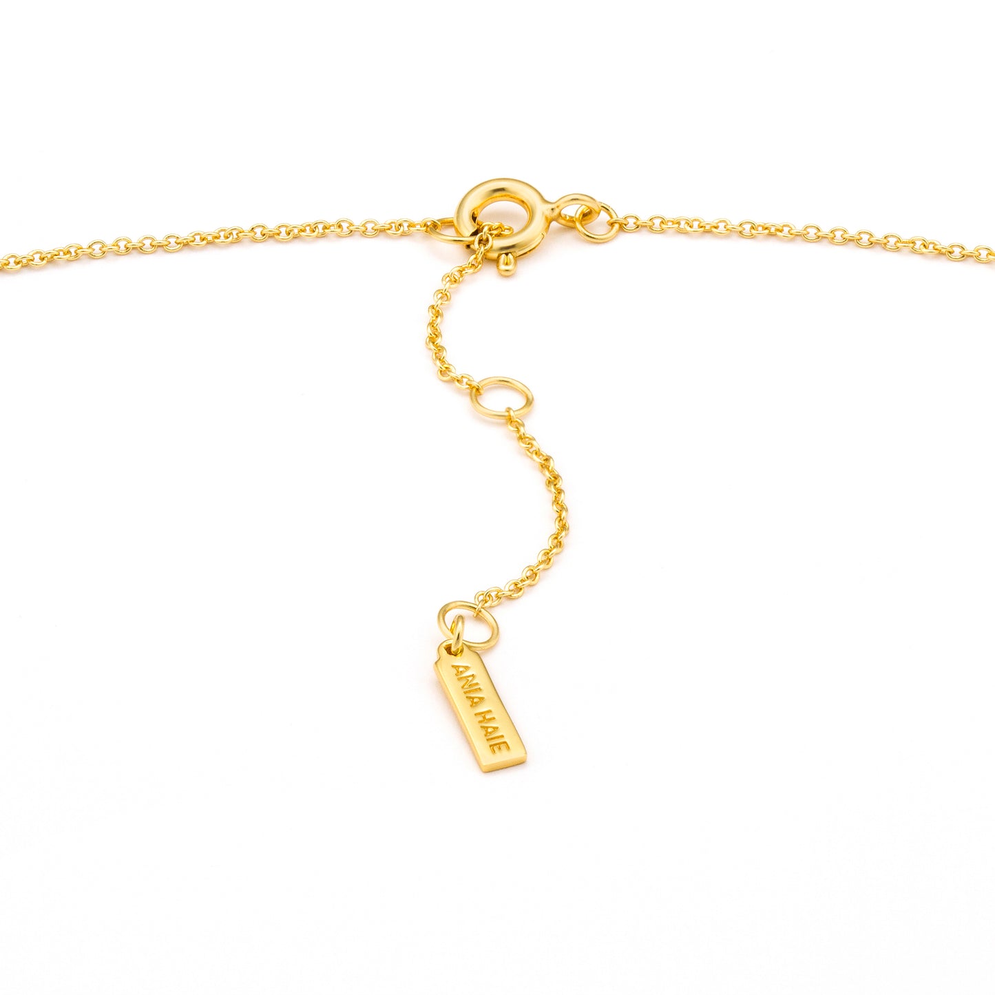 Gold pearl necklace clasp detail close up