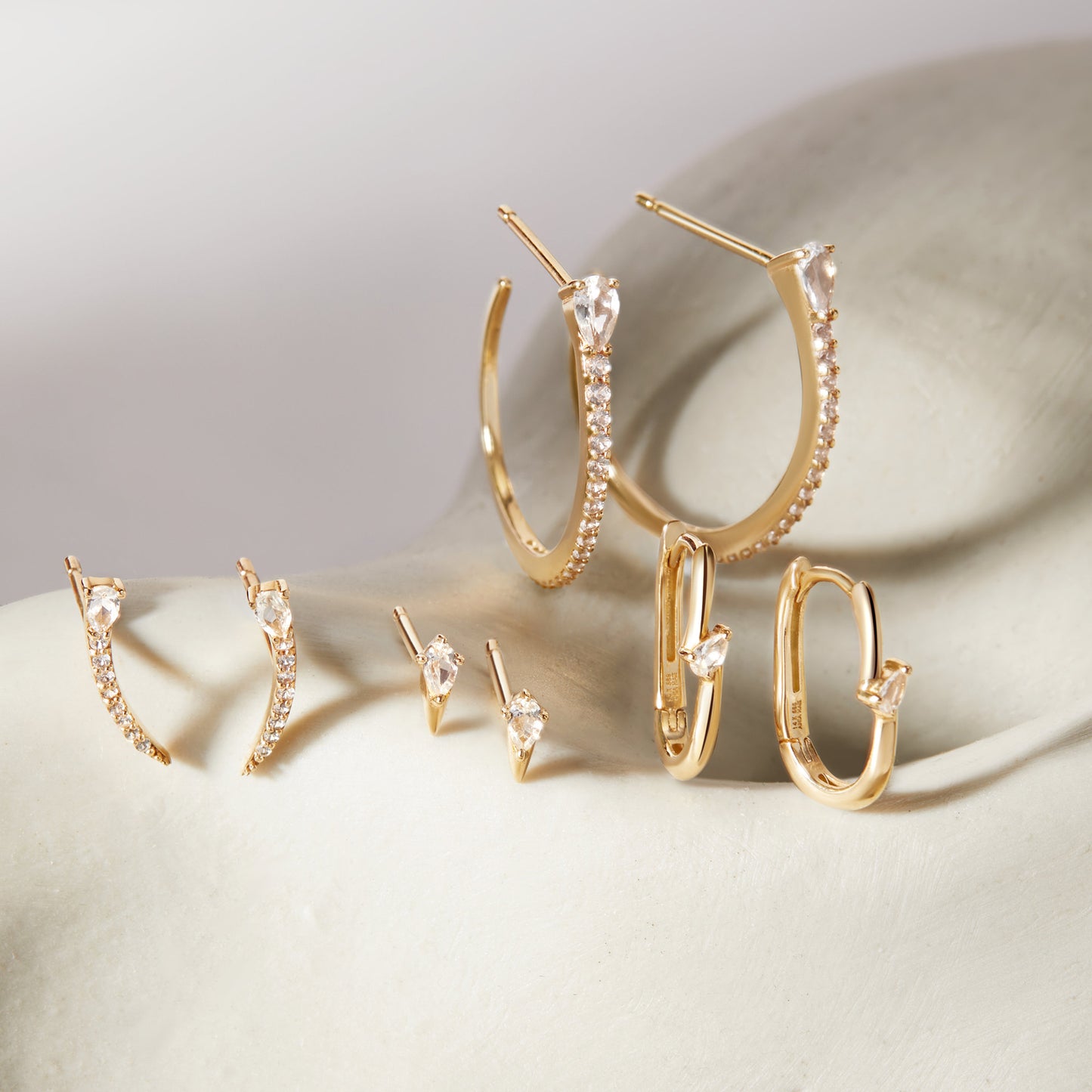 14kt Gold White Sapphire Oval Earrings