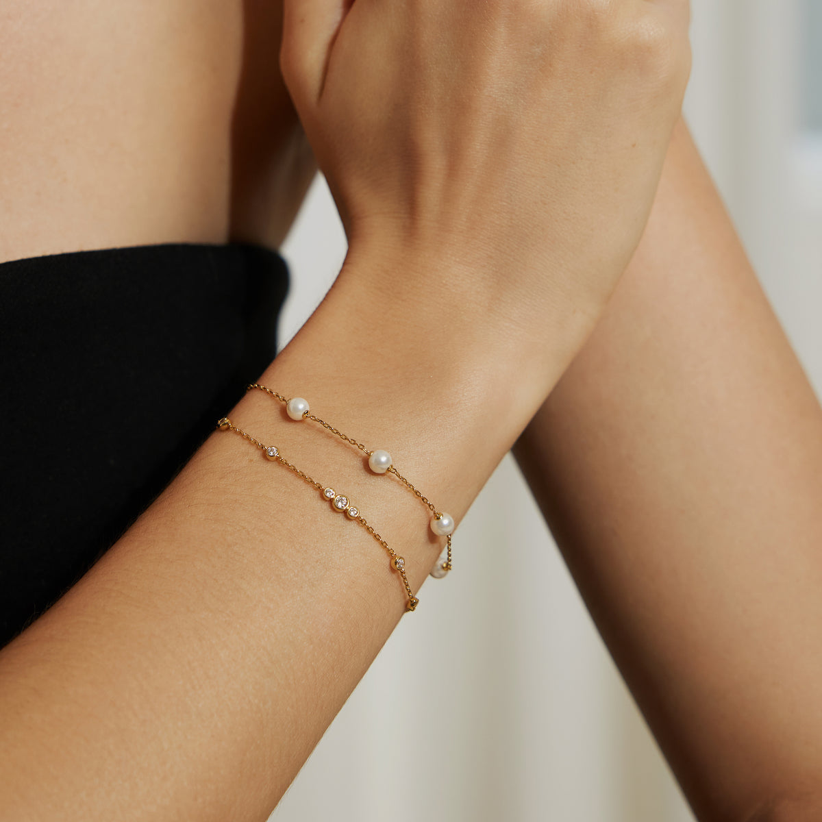 Gold Sparkling Bezel Cubic Zirconia Station Bracelet