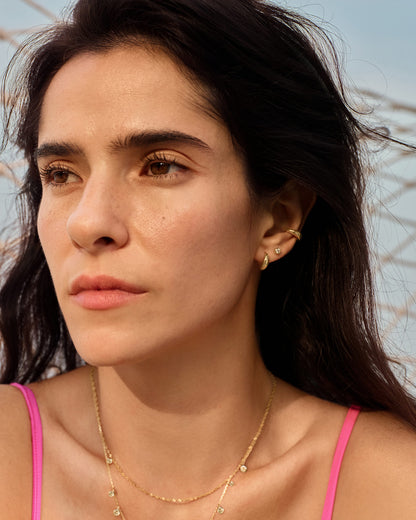 Gold Small Pavé Disc Stud Earrings with layered earrings look