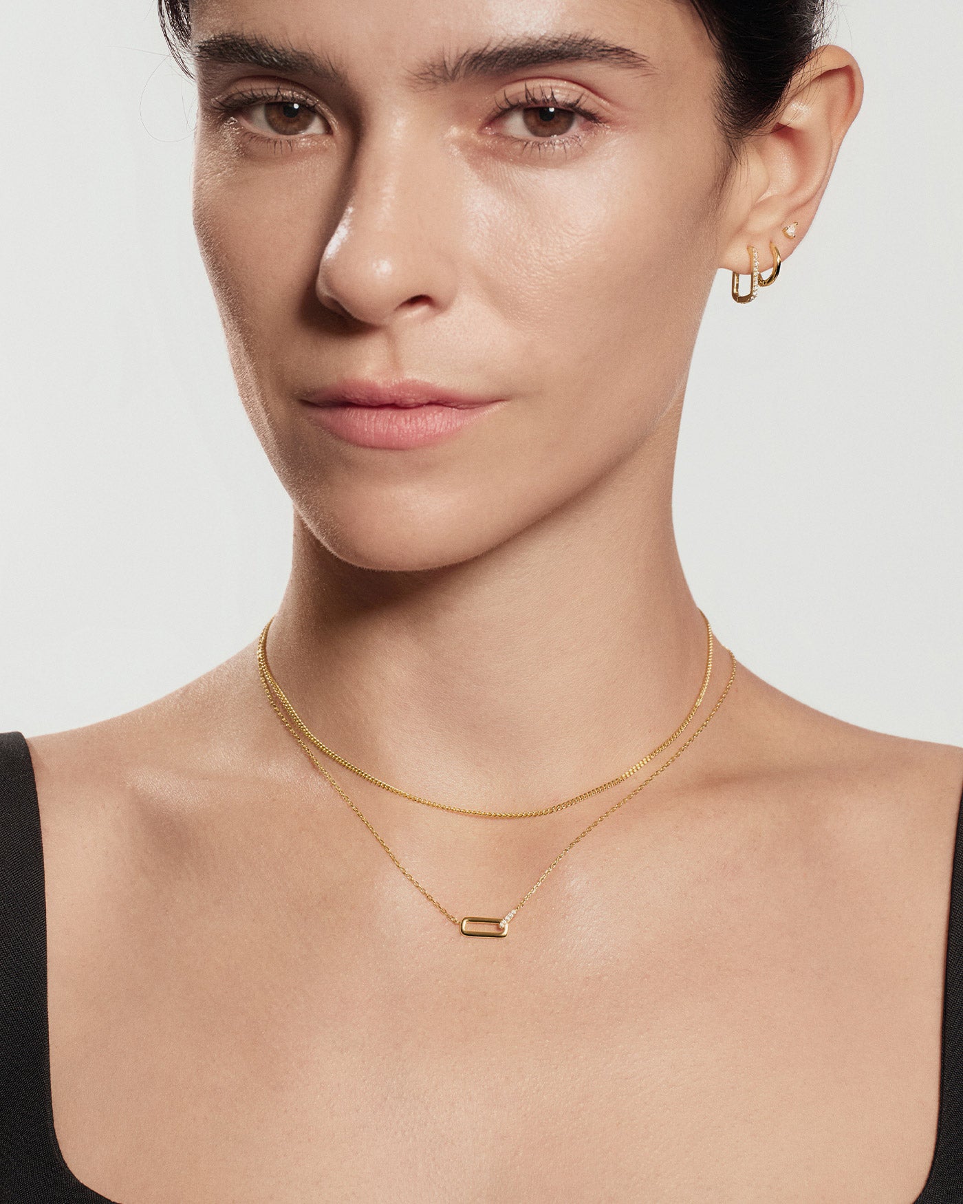 Gold Glam Interlock Necklace with a gold chain