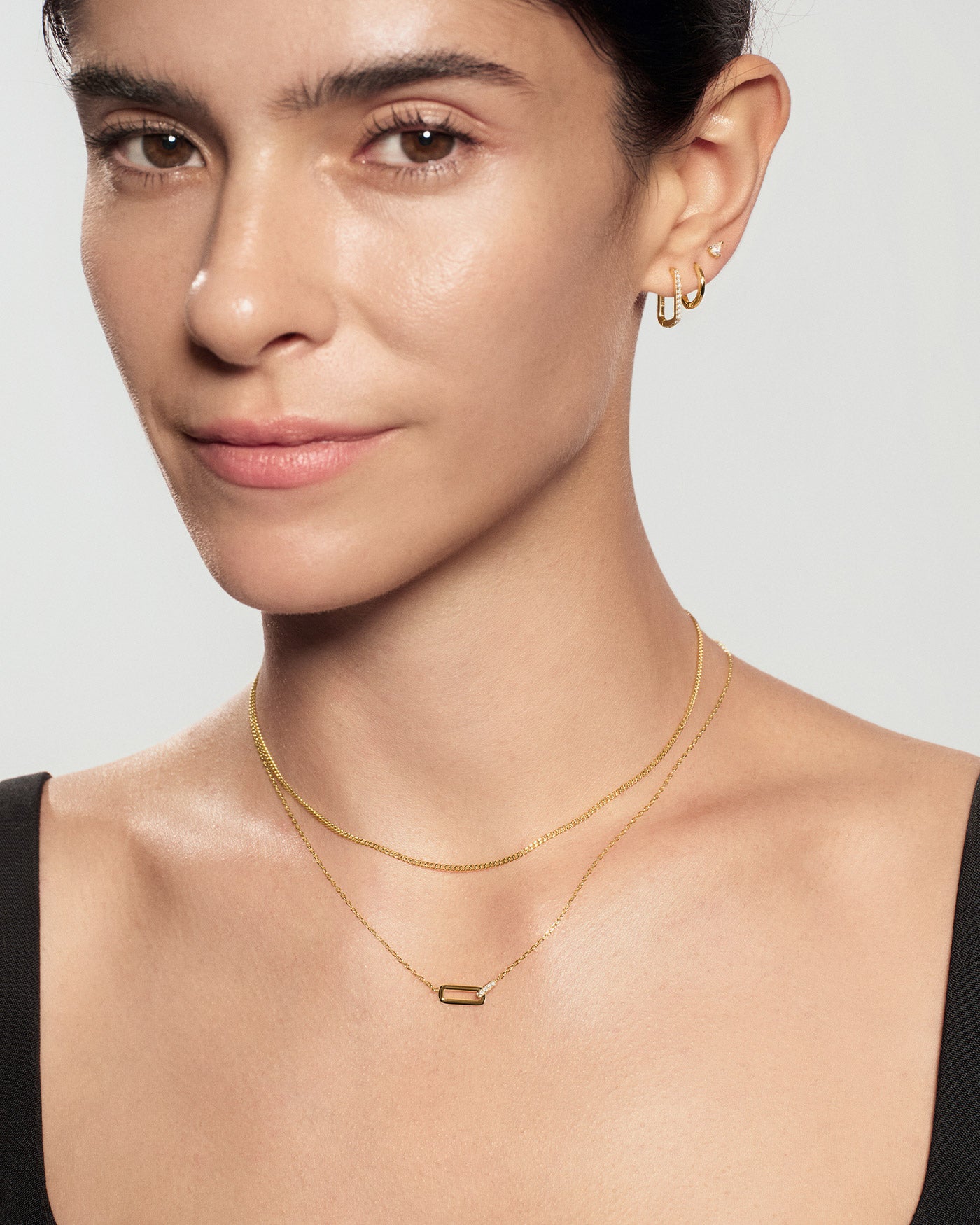 Gold Glam Interlock Necklace wron on neck