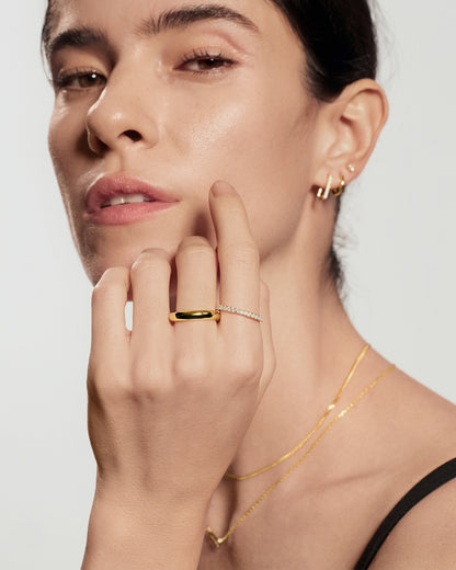 Gold pavé ring stacking with other gold rings