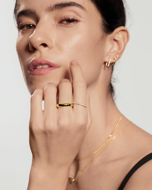 Gold pavé ring stacking with other gold rings