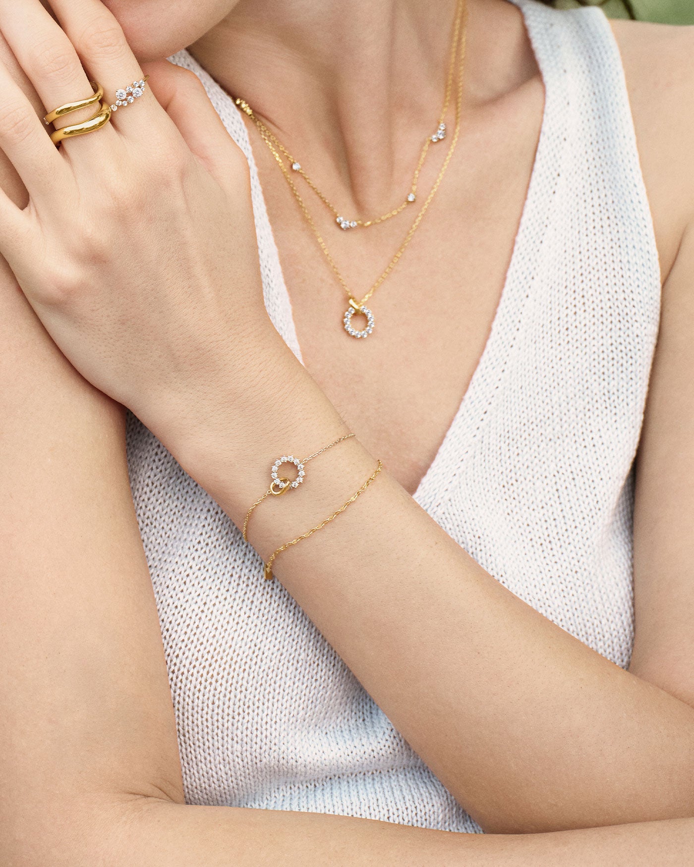 Gold Interlinked Circles Pavé Bracelet on hand