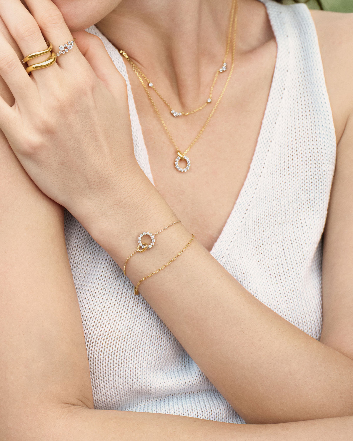 Gold Interlinked Circles Pavé Bracelet on hand