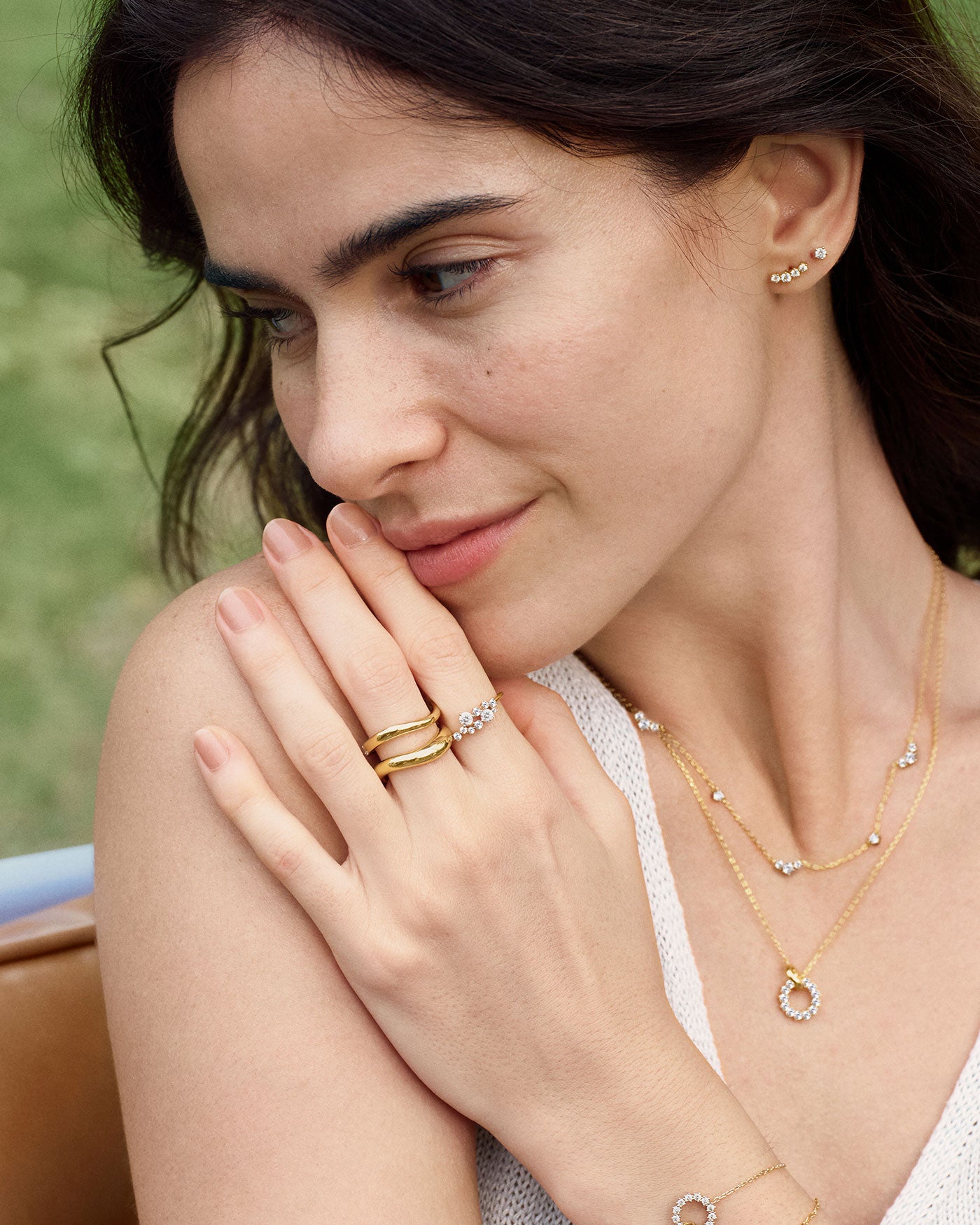 Ania Haie necklace stacked with other necklaces